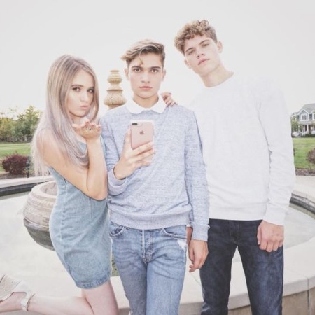 Collete Davis with her two brothers.